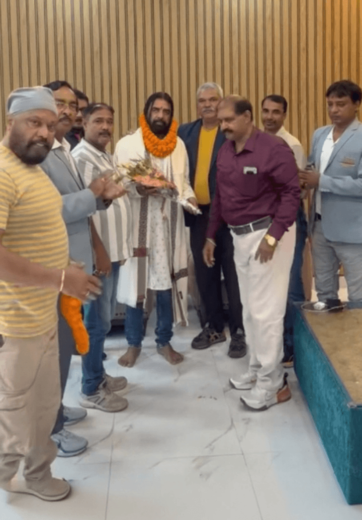 Manoj Singh receiving a community welcome
